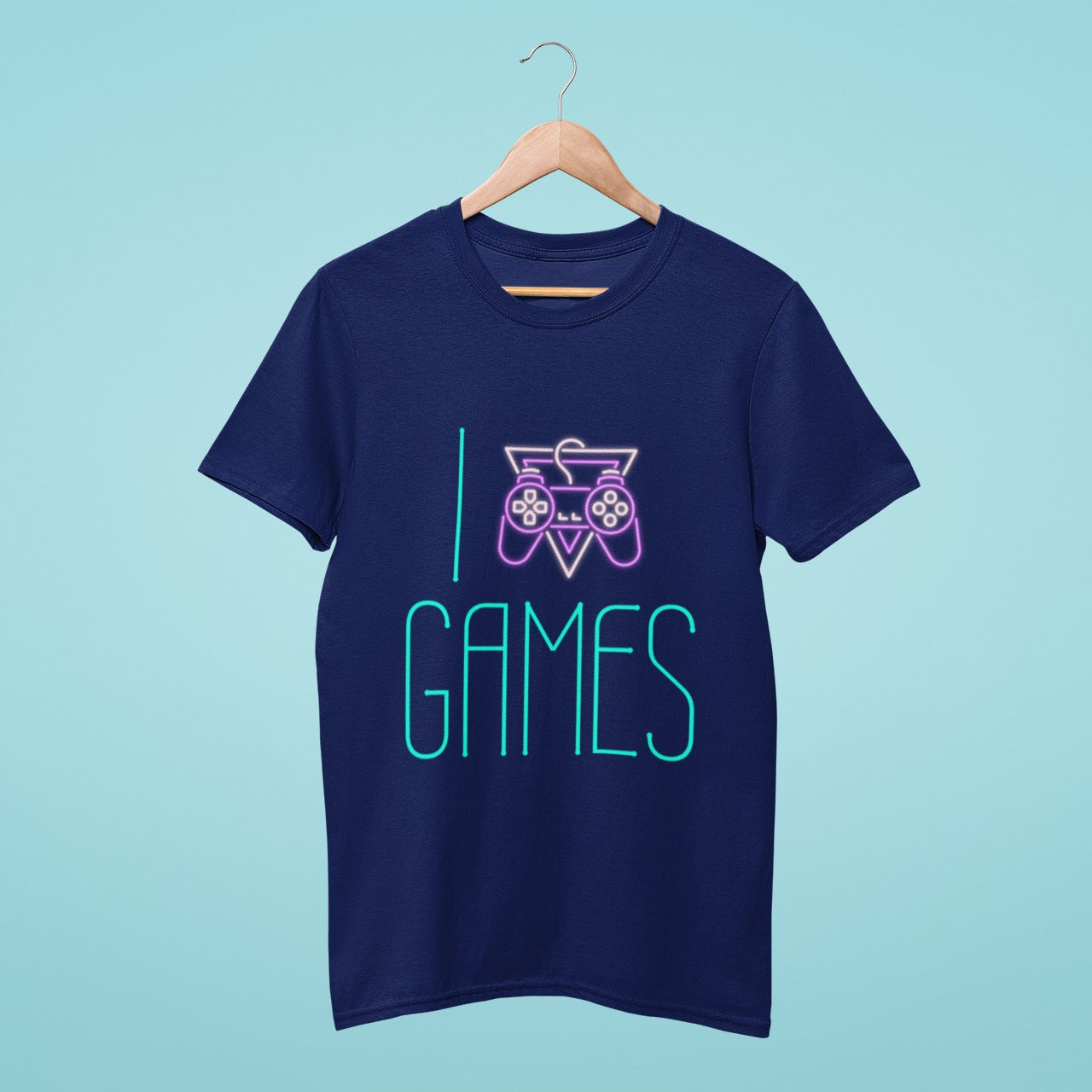 "I ❤️ Games" like never before! Show your love for gaming with this navy blue t-shirt featuring a fun and creative design of a joystick replacing the heart. Perfect for gamers of all ages and levels, this shirt will surely level up your gaming style.