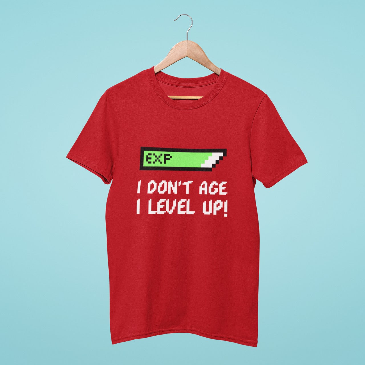 Looking for a fun and playful t-shirt? Check out our red t-shirt with the slogan "I don't age, I level up" and an almost full experience bar graphic. Perfect for gamers, this shirt is made from high-quality materials and is designed to be comfortable and durable. Order yours today and level up your wardrobe!