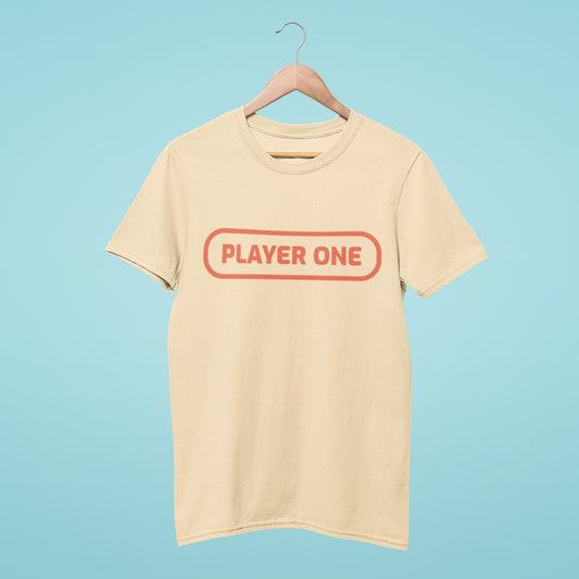 Be the ultimate Player One with this beige t-shirt featuring a game button style 'Player One' text. Perfect for gaming enthusiasts and those who want to level up their style game.