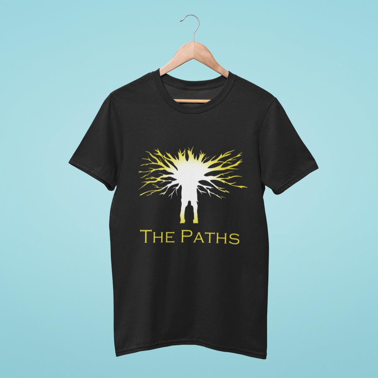 Upgrade your wardrobe with our black t-shirt featuring "The Paths" silhouette in golden from Attack on Titan anime! Made with high-quality materials for comfort and durability, this shirt is perfect for any fan of the series. Order now and show off your style!