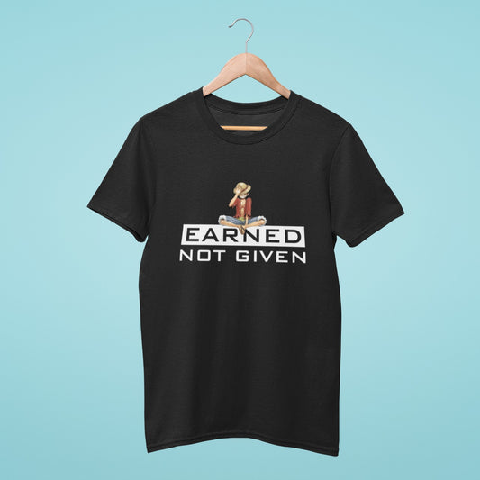 Show off your love for One Piece with our black t-shirt featuring Luffy holding his signature straw hat and sitting on the inspiring message "Earned Not Given." Made with high-quality materials, this comfortable and durable t-shirt is perfect for any fan of the anime series. Order now and add this stylish t-shirt to your One Piece collection!