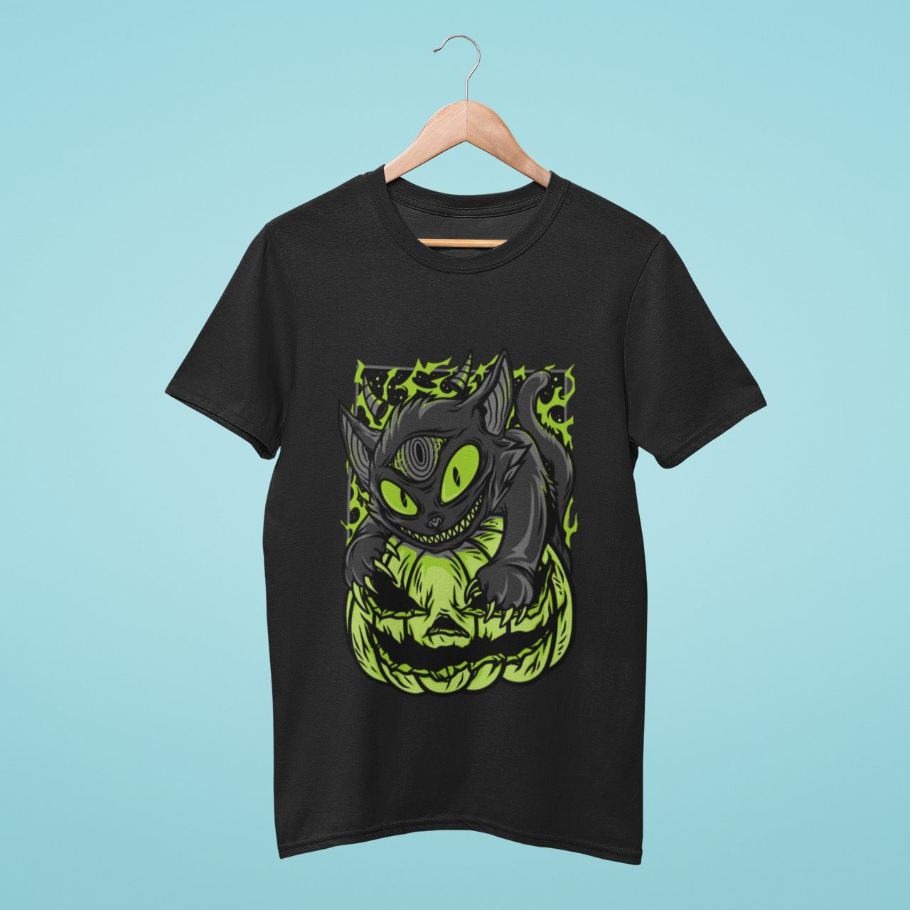 This black t-shirt features a striking design of a black cat with an open third eye pouncing on a neon green Halloween pumpkin. Made from high-quality materials, it's perfect for Halloween parties or showing off your spooky style. Order now to make a statement this Halloween!