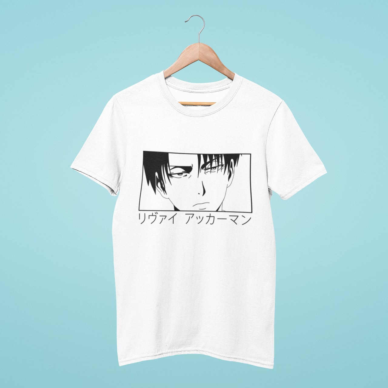 Get ready to showcase your love for Attack on Titan with our sleek white t-shirt featuring a powerful black and white image of Levi Ackerman's serious and determined face, with his name in Japanese characters below. Made with high-quality materials, this shirt offers both comfort and style. Perfect for anime conventions and casual outings, get yours today and add some edge to your wardrobe!