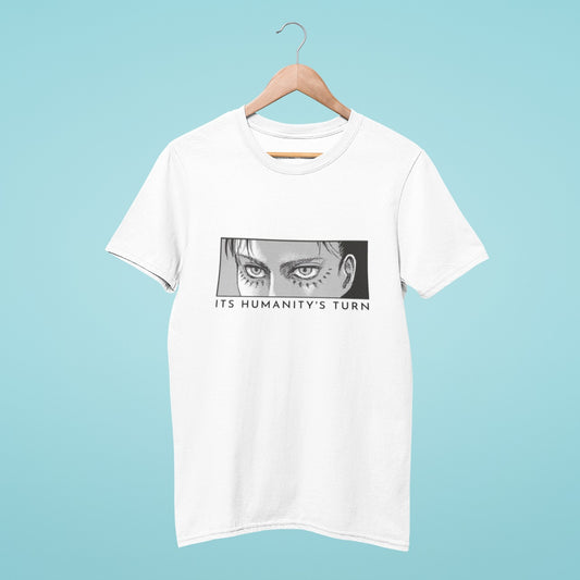 Get ready to show your love for Attack on Titan with our white t-shirt featuring a powerful black and white image of Eren Yeager's serious face, with the caption "It's humanity's turn." Made with high-quality materials, this t-shirt offers both comfort and style. Perfect for anime conventions and casual outings, get yours today and add some edge to your wardrobe!