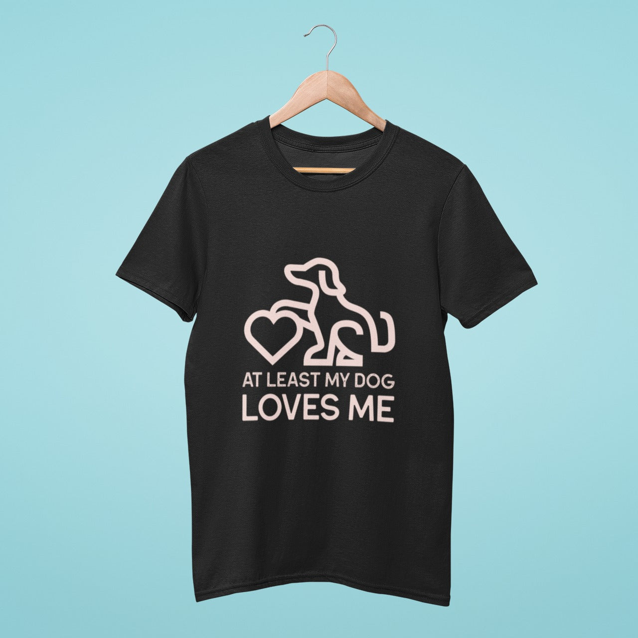 Show your love for your furry friend with our 'At Least My Dog Loves Me' t-shirt. Featuring a simple yet heartwarming line drawing of a dog sitting on a heart, this black tee is perfect for any dog lover who knows that their pup's love is unconditional.