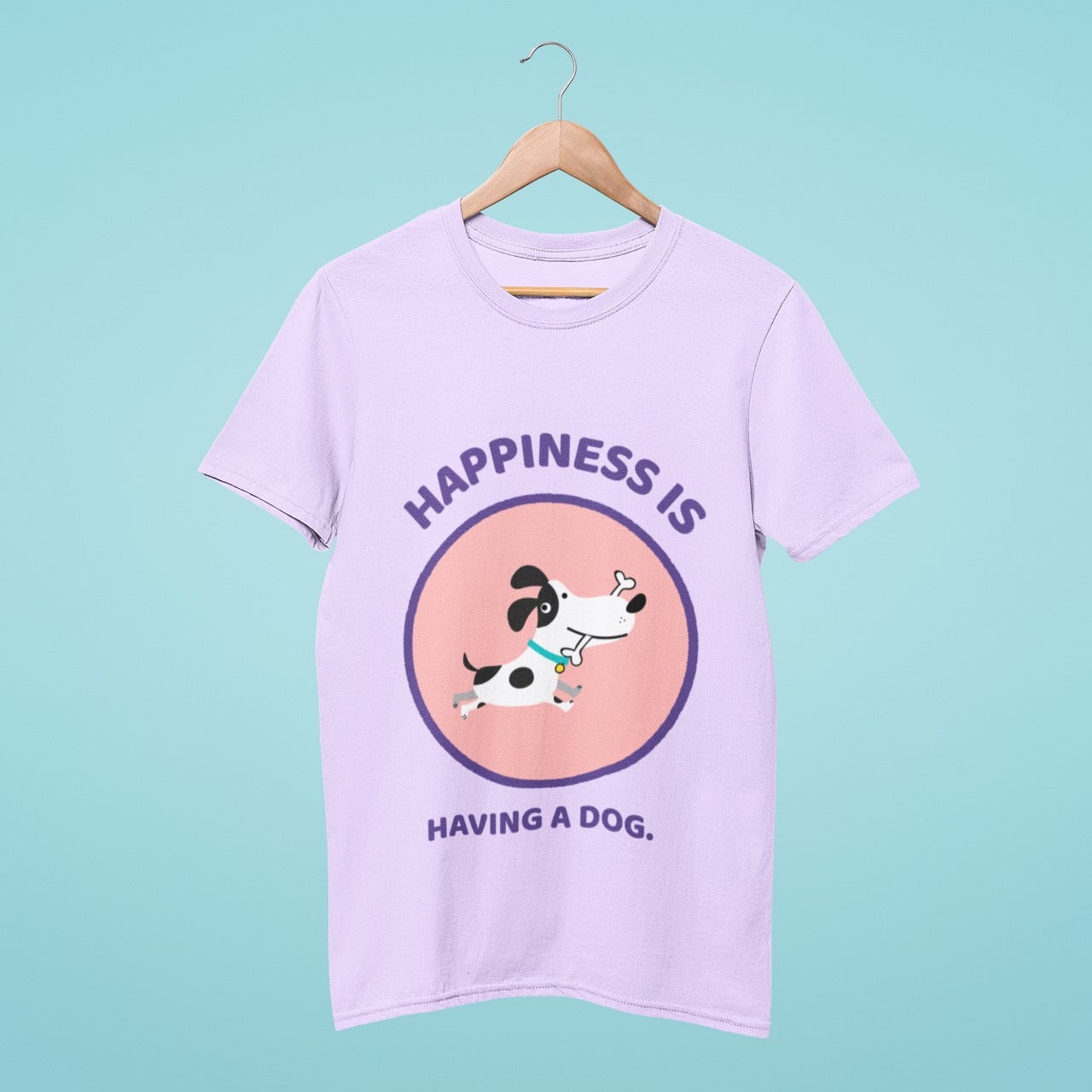 This lavender t-shirt with the title "Happiness is Having a Dog!" and a charming graphic of a cartoon dog running with a bone in its mouth is perfect for any dog lover. Made from high-quality material, this shirt is comfortable and durable. Express your love for your furry friend while staying stylish and comfortable in this adorable shirt. Order yours today!