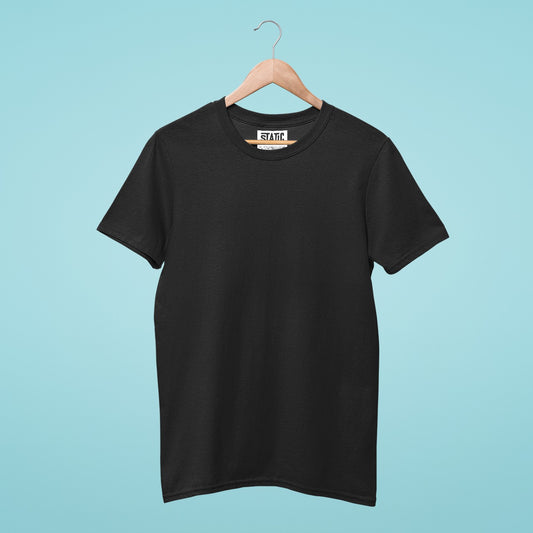 Our black simple and basic round neck t-shirt is a must-have staple in your wardrobe. Made of high-quality cotton, it's soft, comfortable, and breathable. Its minimal design allows for endless outfit possibilities, perfect for dressing up or down. Available in multiple sizes, it's perfect for those who appreciate simplicity and style. Whether for work or casual wear, this black tee will keep you looking sharp and comfortable all day. Get yours now!