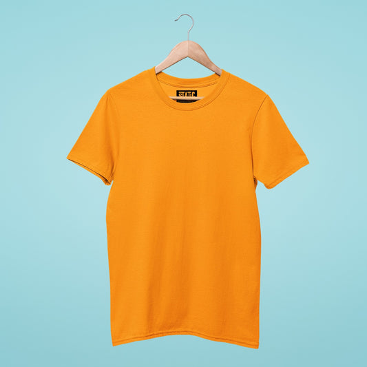 Add a pop of energy to your wardrobe with our orange round neck t-shirt. Made from high-quality cotton, this t-shirt is comfortable and perfect for daily wear. With its simple yet stylish design, it pairs easily with any bottom. Available in a range of sizes, our orange t-shirt is a versatile addition to your wardrobe. Elevate your fashion game today with this bold and vibrant t-shirt.