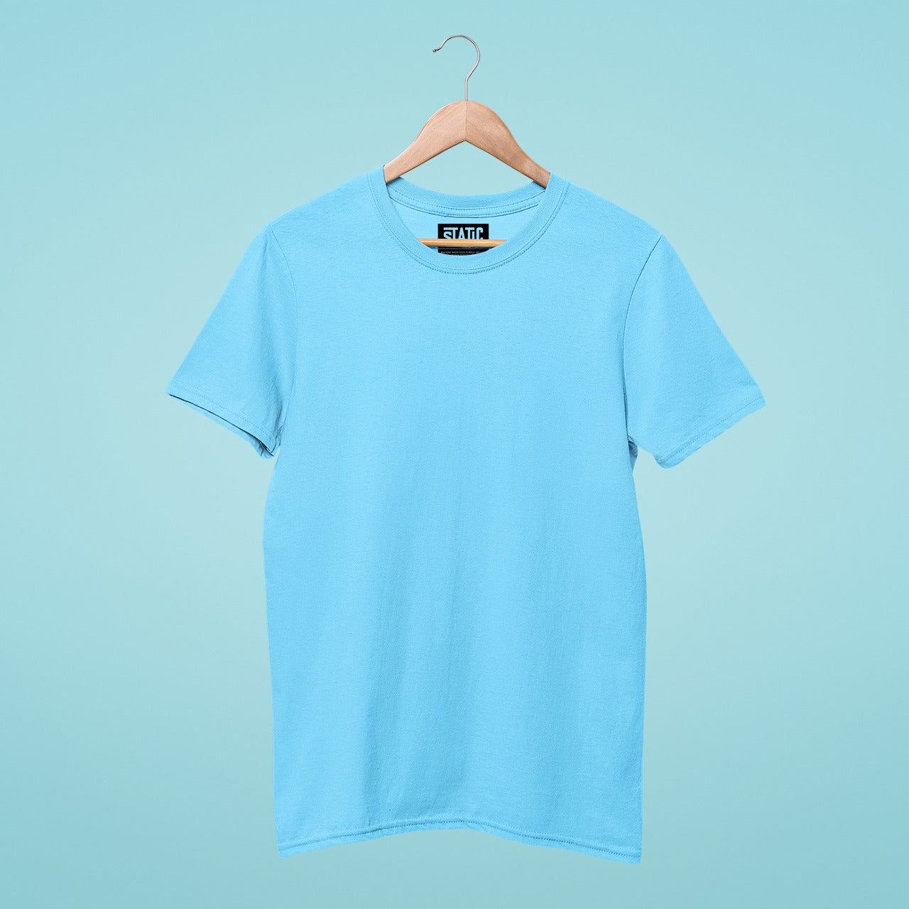 Our sky blue simple and basic round neck t-shirt is a soft and durable wardrobe staple, perfect for everyday wear. Its minimalist design with no graphics makes it a versatile piece that can be paired with any bottom, adding a touch of sophistication to your outfit. Available in various sizes, it's perfect for those who love simplicity and elegance in their clothing. Add a touch of refinement to your style today.
