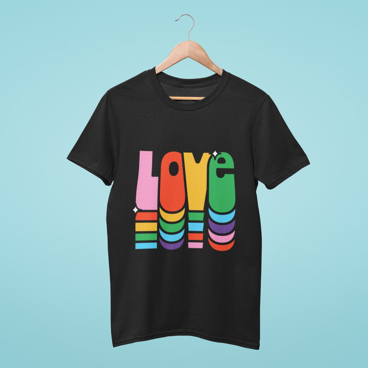 Show your support for love and pride with our black t-shirt featuring "love" in big, colorful letters. Perfect for LGBTQ+ events and Pride celebrations, this tee is both stylish and comfortable. The bold and vibrant design is a powerful symbol of acceptance and inclusivity, spreading the message of love and equality everywhere you go. Order now and join the movement for a more inclusive world.