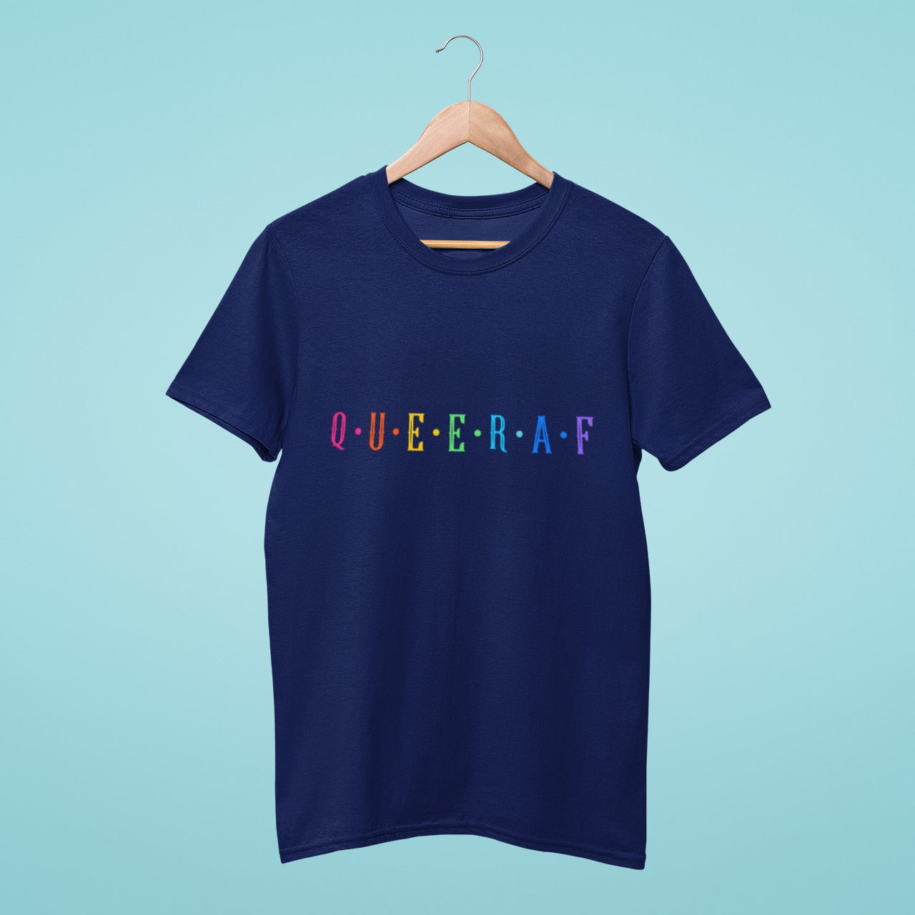 Express your queer identity in style with our navy blue t-shirt featuring "Q U E E R A F" in rainbow colors. Made from high-quality materials, this tee is perfect for LGBTQ+ events and rallies. Show your pride with the bold and vibrant design that is sure to make a statement. Order now and add this powerful and uplifting t-shirt to your wardrobe, letting the world know that you are proud to be who you are!