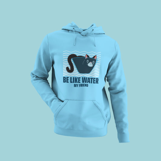 Stay calm and collected with this sky blue hoodie featuring the famous quote "be like water my friend" and a cat sitting inside a glass tumbler in its shape. The comfortable material and eye-catching design make it perfect for everyday wear. Order now to add some fluidity and flexibility to your style!