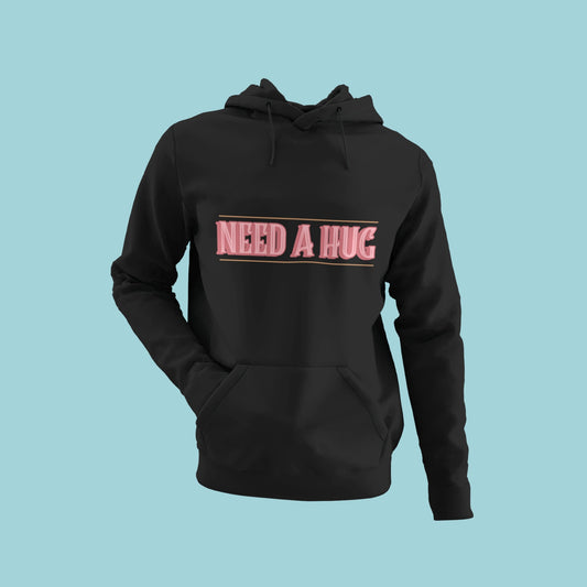 Get the comfort you need with this black hoodie featuring 'NEED A HUG' in bold pink letters. Perfect for those who want to express themselves in a classic style. Stay cozy and stylish with this essential piece that's sure to get you noticed.