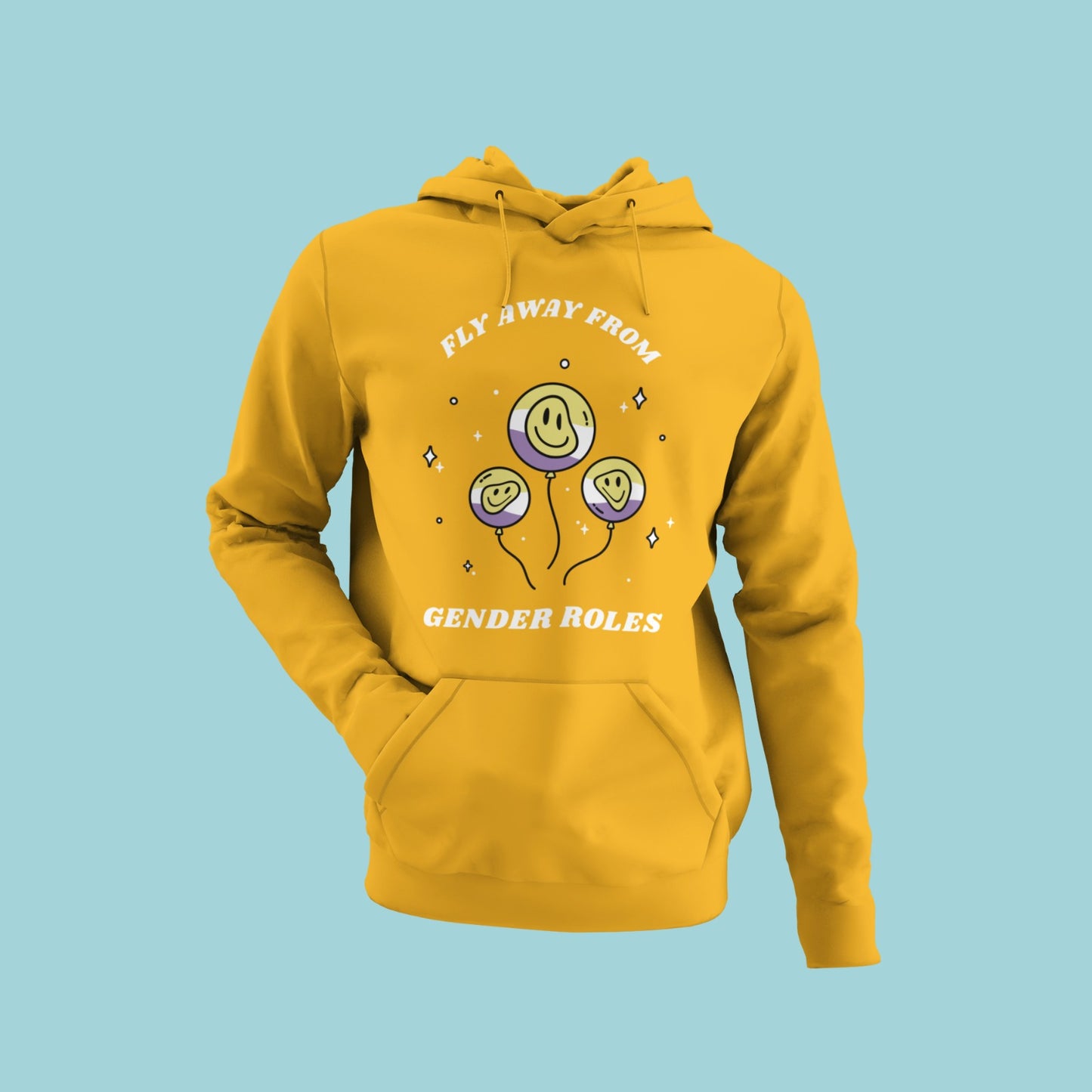 This yellow hoodie features a bold message "Fly Away From Gender Roles" with a graphic of three smiley-faced balloons floating away. Break free from societal norms with this unique and stylish piece. Perfect for those who value individuality and want to make a statement. Get ready to soar in this comfy and eye-catching hoodie!